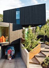 In this modular prefabricated home in Northeast Portland, Oregon, the triangle is the home’s leitmotiv, appearing in the cantilevered bedroom module and the steps approaching the home. It was designed by Jeff Kovel of Skylab Architecture.