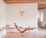 A peek inside the studio of Georgia O'Keefe. We love the contrast of green and coral on the chair and the pale wood and bone elements used throughout. Via Improvised Life. (Pin)