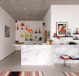 For those of us who are just so over the book spine rainbow trend, perhaps it's time to move on to the kitchen. (Also: check out that Carrara-clad counter!) Via 2Modern. (Pin)