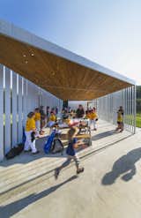 At one point, the student architects considered including a translucent glass façade, but budget realities and foul balls changed their minds. “The kids were playing games while we were constructing the fieldhouse,” says Myers. “We were a little worried about where a foul ball might go.”