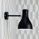 The Type 75 Wall Lamp is an elegant wall light that is designed to fit seamlessly into a modern home. The lamp is defined by its classic Anglepoise looks—it features clean lines and a simple shade. The Type 75 Wall light can be used on its own or paired with another Type 75 Wall light to frame a bathroom mirror, headboard, or desk.