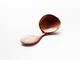 “Apple wood is nice to carve; it’s soft when fresh. The shape of this one is controlled by the tree’s growth pattern. It took a lot of sanding.”  Search “odd-size-measuring-spoons.html” from This Designer Has Carved a Spoon Every Day For a Year