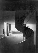 Charles de Beistegui, a collector living in Paris in the 1930s, commissioned Le Corbusier to design a spectacular penthouse apartment for him on the Champs-Élysées. Though the home no longer exists, save for archival black-and-white shots, Michael Herrman was greatly inspired by it. Seen here, a spiral staircase in the living room of Beistegui's apartment.