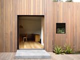 A timber rain screen made of locally-sourced spotted gum clads the house. “It’s basically like a tortoise shell in that it’s a protective layer, a shield, that allows the building to be protected from the sun and insulated from the cold,” Kennon says. Because of its high density, the Australian hardwood stands up well against the elements.