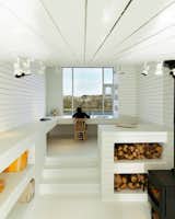 A white-filled (not to mention light-filled) interior bring the minimalist design inside. Newfoundland, Canada. By Saunders Architecture from the book Rock the Shack, Copyright Gestalten 2013.
