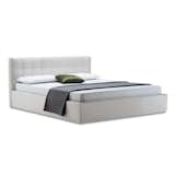 The Box bed by Zanotta lifts up to reveal a cache of storage space below the mattress.