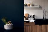A beautiful still life is paired with an image of this modern kitchen sink and counter top.