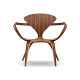 Connecticut. Benjamin Cherner reproduces the iconic designs of his father, Norman, for the Cherner Chair Company, based in Ridgefield, Connecticut. The furniture, like this lounge arm chair, sports organic shapes made in molded plywood with a natural walnut finish.