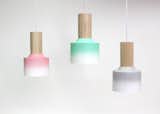 Florida. Husband-and-wife team Damm Design create sculptural lighting designs that beam with personality. Their Hombre pendants are composed of recovered lighting parts, refinished in an ombre fade by a local motorcycle painter.