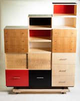 Virginia. Furniture-maker Todd Leback avoids stains and paints, preferring instead to let high-quality materials speak for themselves. Here, however, the grain of a custom cabinet is complemented by restrained use of black and red.