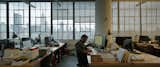 As Siegel's camera visits architecture studios around the city from downtown Manhattan and Fifth Avenue to Brooklyn, similarities both functional and stylistic appear in the form of loft-like spaces, communal work tables, and other omnipresent tools of the trade.  Photo 3 of 5 in "The Architects" Offers a Peek into New York's Architecture Firms
