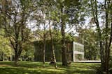 French designer Philippe Starck worked with Slovenian prefab builder Riko to create an ecologically minded prototype called P.A.T.H. The first of its kind is built at a wooded test site in Montfort l’Amaury, near Paris.
