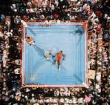 A perfectly composed bird's-eye view of a boxing match.