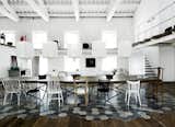 For the floors in the kitchen and throughout, architect Paola Navone placed hexagonal Carocim tiles of her own design. Photo by: Wichmann + Bendtsen