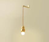 The Ball Light by Michael Anastassiades perfectly expresses the current mood for minimal, simple brass pieces. (Pin)