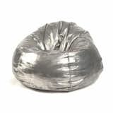 Artist Cheryl Eckstrom’s aluminum bean bag chair sculpture plays with perspectives of soft and hard.