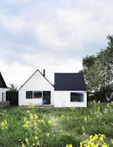 Set in the Swedish summer retreat area of Österlen, this conversion of an abandoned farmhouse re-thinks and plays on the notion of "nostalgia and shelter by combining them with very contemporary desires for space, light and nature," say the architects. Photo by Thomas Ibsen.  Photo 1 of 5 in Organic Living  by Jami Smith
