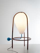 A lamp that you pump up? Inquisitive kids will love the Olab lamp by Grégoire de Lafforest for Paris Galerie Gosserez. Squeeze the bulb-like pump to illuminate the lacquered steel and blown glass balloon-shaped lamp. (Pin).