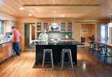 For their lakeside retreat in northwestern Michigan, Keith and Mary Campbell renovated a 1970s ranch house to include a spacious kitchen-dining room.  Photo 3 of 13 in Modern Kitchen Renovations by Luke Hopping from Spacious Kitchens
