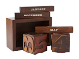 Woodblock calendar that Eiland helped create for Fossil, based on vintage woodtype.