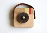 Inspired by the photo sharing app Instagram, the nostalgic Anagram Wooden Camera, $35, sports the same striped colors (minus the blue) and is handmade from sustainable wood, cork, and leather.