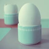 EGG CUPS

With their geometric design and pale turquoise hue, these little egg cups from Burkedecor by Ferm Living make a pretty addition to your Easter brunch table.