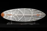 This "surfboard" is designed purely in 3-D CAD software, 3-D printed via Selective Laser Sintering by SciCon Technologies in Valencia, California, and assembled at Karten Design in Marina Del Rey, California.