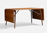 Danish furniture designer Børge Mogensen was one of a handful responsible for crafting the "Danish modern" look so prevalent throughout the 20th century. His teak dining table, model 162, is expected to net between $1,000 and $1,500—a real bargain if you encounter few other bidders.  Photo 8 of 10 in Shopping Mass Modern Auction at Wright  by Kelsey Keith