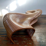 Woodworker Matthias Pliessnig first uncovered the steam-bending technique when tasked with designing a boat. Pictured is his Sinuo 5m bench.