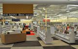 McAllen Public Library in McAllen, Texas, USA-When the city of McAllen acquired an old retail property, they brought on Minneapolis-based architects Meyer, Scherer & Rockcastle, Ltd. to convert the space into a massive new public library that looks nothing like the Wal-Mart it once was. The largest single-story public library in the United States, the new McAllen Public Library now includes a massive children's area with one of the largest teen areas in the state, an art gallery, a 200-seat auditorium, and—because you can't scrub off the Wal-Mart entirely—a food court-esque snack bar. Photo: Kristy Cho