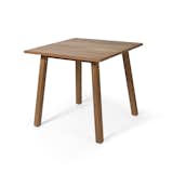 The Oxnö Dining Table is crafted in a warm teak and can sit two people comfortably for dinner, or can be used as a cocktail table to seat four. The table can be oiled once a year to retain the rich teak color, or left alone to develop a silvery grey patina over time. Skargaarden’s Oxnö series also includes an armchair.  Photo 4 of 7 in Summer Teak Products We Love by Marianne Colahan