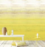 Degrado Amarillo wallpaper by Eijffinger. The Dutch company’s Ibiza collection saturates walls in degrees with a photorealistic paper that adds an of-the-moment gradient  effect.
