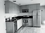 The old kitchen became a bedroom that doubles as a study.  Photo 11 of 15 in A Hollywood Hills Midcentury by Three Case Study Legends Gets a New Outlook