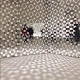 Nendo's Fragment screen for Glas Italia is composed of two layers of transparent glass fitted with mirrors.