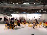 For The Armory Show 2012, Bade Stageberg Cox collected chairs off the New York City streets and covered them in bright yellow epoxy the same hue as the city's recognizable taxi cabs. The bottom of each Streetseat is stamped with the location from which it was recovered.