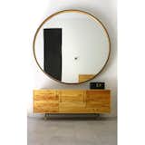 LEATHER MIRROR

You can really add some drama to a room with the size of this distressed leather framed mirror lined with wood. 72" diameter.  Search “products” from Best Mirrors for Decorating