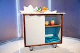 Stout and Champley created this sideboard cabinet made of steel, walnut and acrylic for the first challenge of the HGTV show.