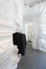 Snarkitecture for Richard Chai (New York, United States: 2010)

Delivering a much bigger impression than its $5,000 price tag suggests, this fashion and fabricator’s dream is a massive carved foam fort, with insets to display the work of designer Richard Chai. The Brooklyn-based architects used heated wires, jury-rigged lick hacksaws, to slowly slice and shape what looks like topographic tundra.