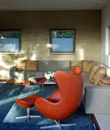 The built-in sofa was designed by CCS Architecture and fabricated by San Francisco-based Kroll Furniture. Barbara Vickroy, CCS's interior designer, picked the fabrics and furnishings in the home. In the foreground is an Arne Jacobsen Egg chair.