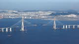Incheon Bridge, South Korea-Providing new road access to Seoul's Incheon International Airport, the bridge is both long (13 miles) and tall (756 feet). It's shown here before its October 2009 completion. Photo by: Ryan Wick
