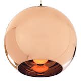 Lighting designer Tom Dixon released this pendant lamp in 2006 at the Milan Furniture Fair. The shade is constructed of plastic polycarbonate and sheathed in a mirror-like copper finish.