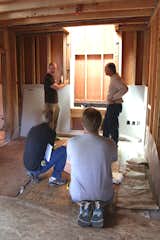 Planning a cabinet installation. The drywall panels are in place temporarily to simulate cabinet panels or to check dimensions between finished walls.  Photo 8 of 17 in Dwell Home Venice: Part 18
