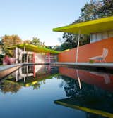 Geometric forms and strong colors provide a perfect backdrop for a day at the pool. The intense colors paired with translucent walls create ethereal puddles of color throughout the property. Photo by: Paul Warchol.
