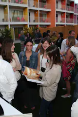 A hip crowd overtook the courtyard at The Saguaro on the opening weekend of Modernism Week and lined up to get their book signed. Photo by: Lani Garfield.