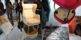 Bonus round two: Fritz Hansen's showroom in Brera is showing the new Ro chair by Spanish designer Jaime Hayon. In addition to the nine regular upholstery options available for the bergère-style armchair, Hayon designed custom versions that represent cities around the world, from Copenhagen to Paris. Those are installed on mirrored platforms to show both the construction of the underside of the chair (impeccable, of course) and a cityscape photo hung from the ceiling.