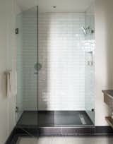 Walk-in rainfall showers can be found in the bathrooms.