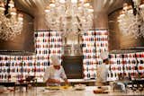 A pair of chefs prepare dishes in the open kitchen at Raffles' one Michelin-starred restaurant, La Cuisine,  described as &quot;refined, generous, and spontaneous French cuisine.&quot;