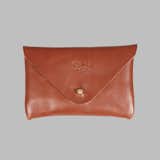 This made-in-San Francisco leather wallet from Joshu+Vela is simplicity itself. A simple brass closure and rich, reddish leather hold all you really need to carry with you. Seriously, leave the iPad at home, man.