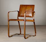 The Buckle Chair in antiqued chestnut by Restoration Hardware has just the right balance of rich warm leather and clean lines making it a beautiful piece for accomplishing that vintage modern look.