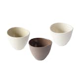 With an organic aesthetic, the ceramic Morijana cups are minimalistic yet tactile. Offered in pleasing neutral hues, these curved cups are the perfect vessel for tea, coffee, or freshly squeezed juice and double as serving bowls for your favorite condiments or a dessert course.